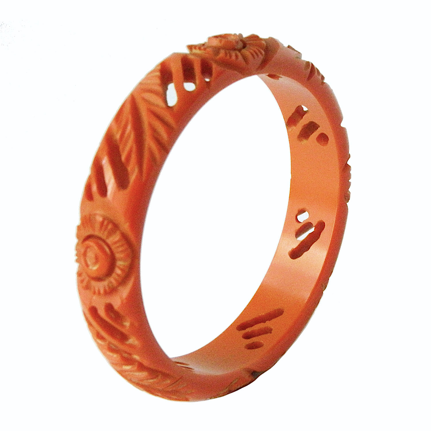 orange carved bakelite bangle