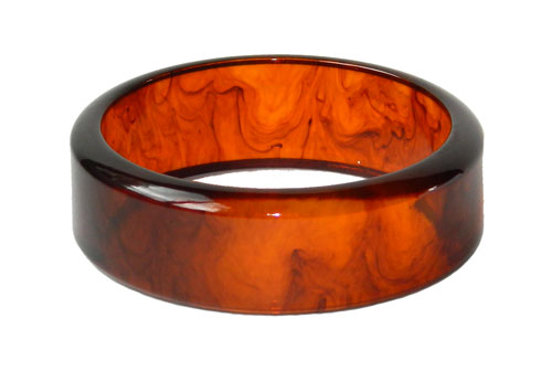 Swirly dark amber bakelite bangle