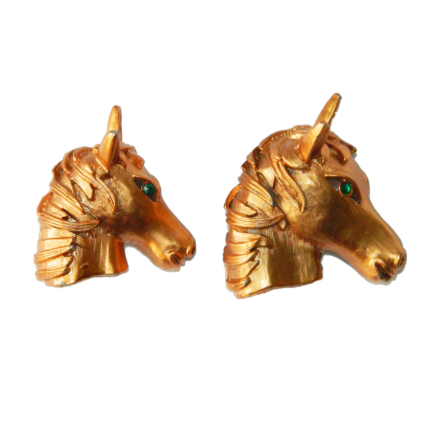 Pair of horse head brooches
