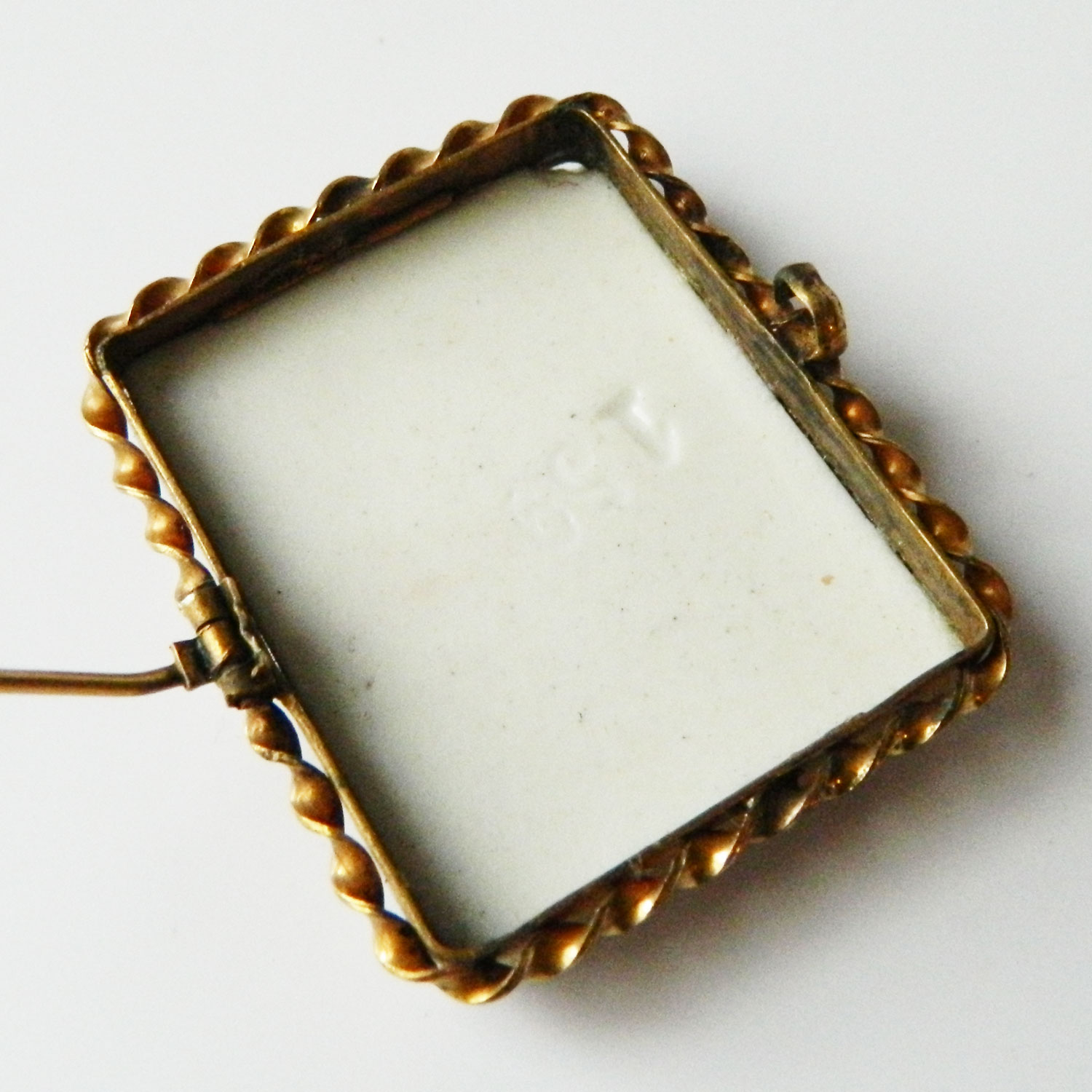 Ceramic cameo brooch