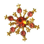 Pink rhinestone snowflake brooch