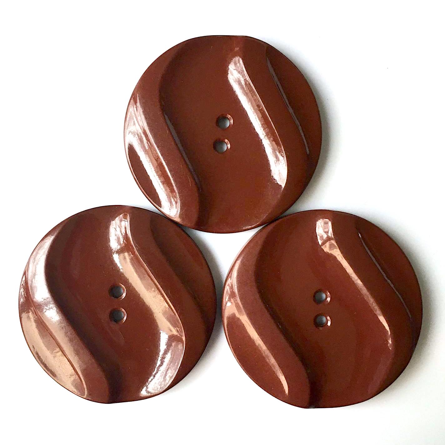 Vintage bakelite coat buttons