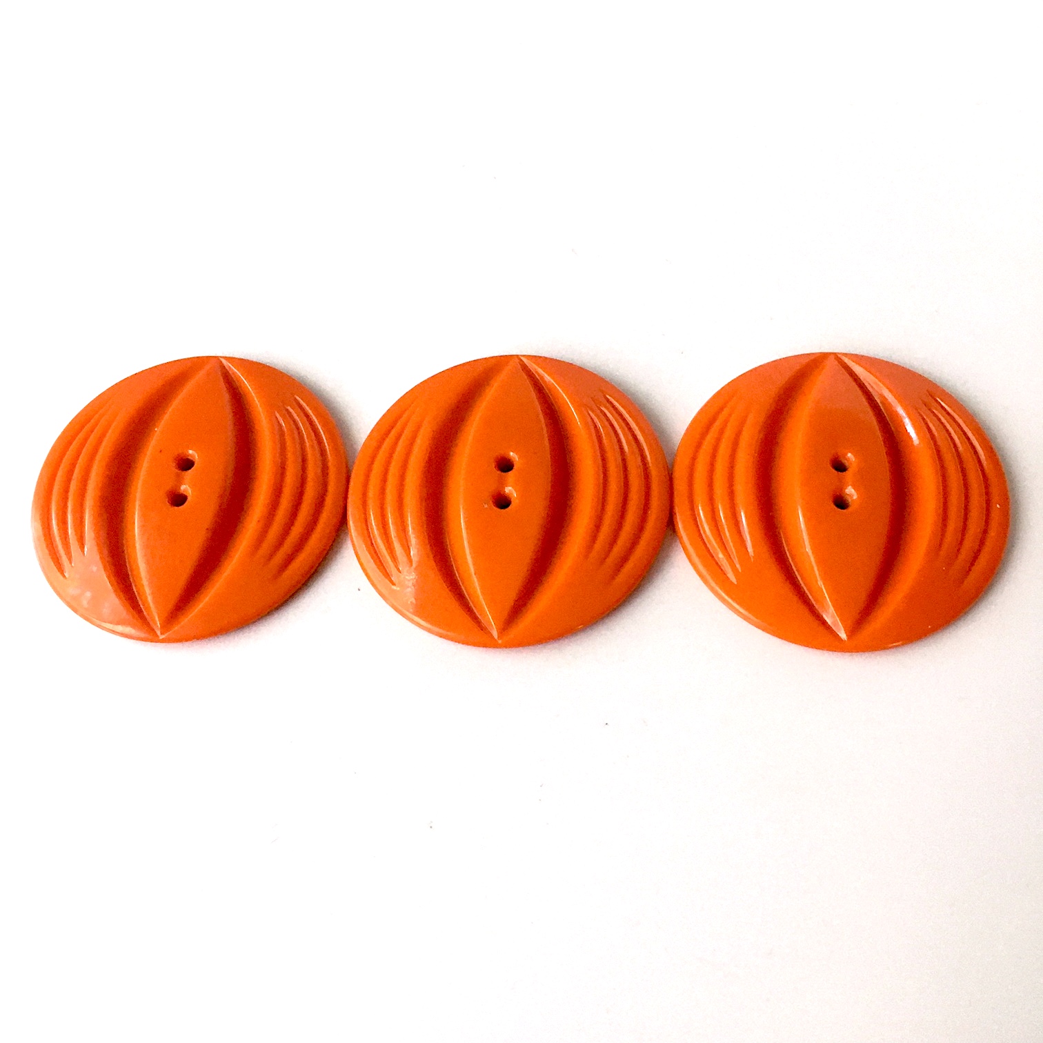 1930s orange coat buttons