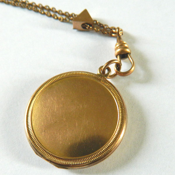 Antique horseshoe locket pendant