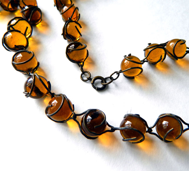 Amber glass pools of light necklace