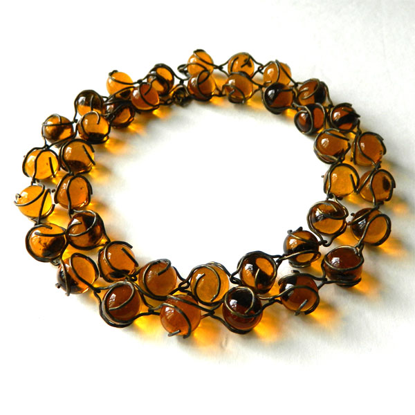 Amber glass pools of light necklace