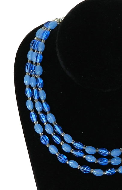 Triple strand blue glass bead necklace