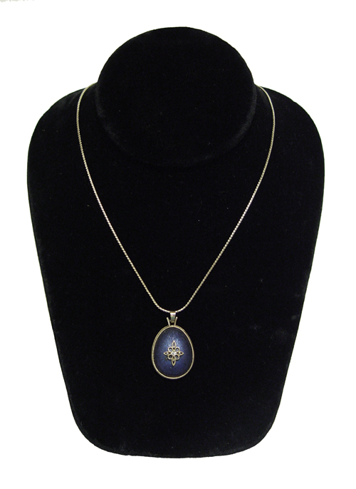 Blue and gold pendant necklace