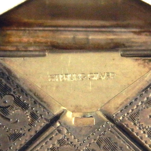 Antique stamp case