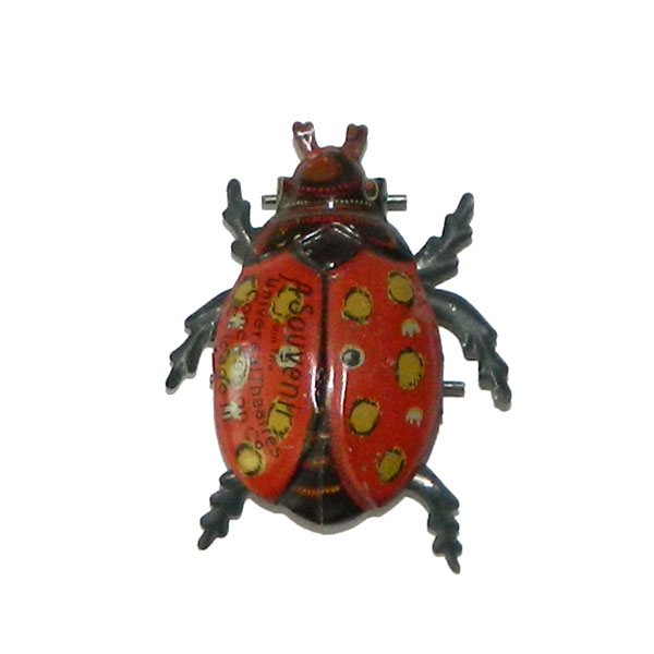 Vintage ladybug tin toy