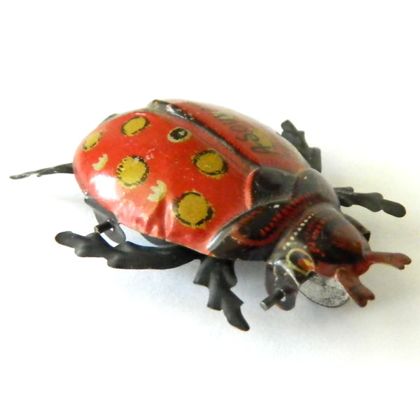 Vintage ladybug tin toy