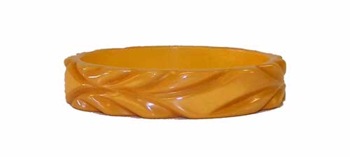 1930's carved yellow bakelite bangle