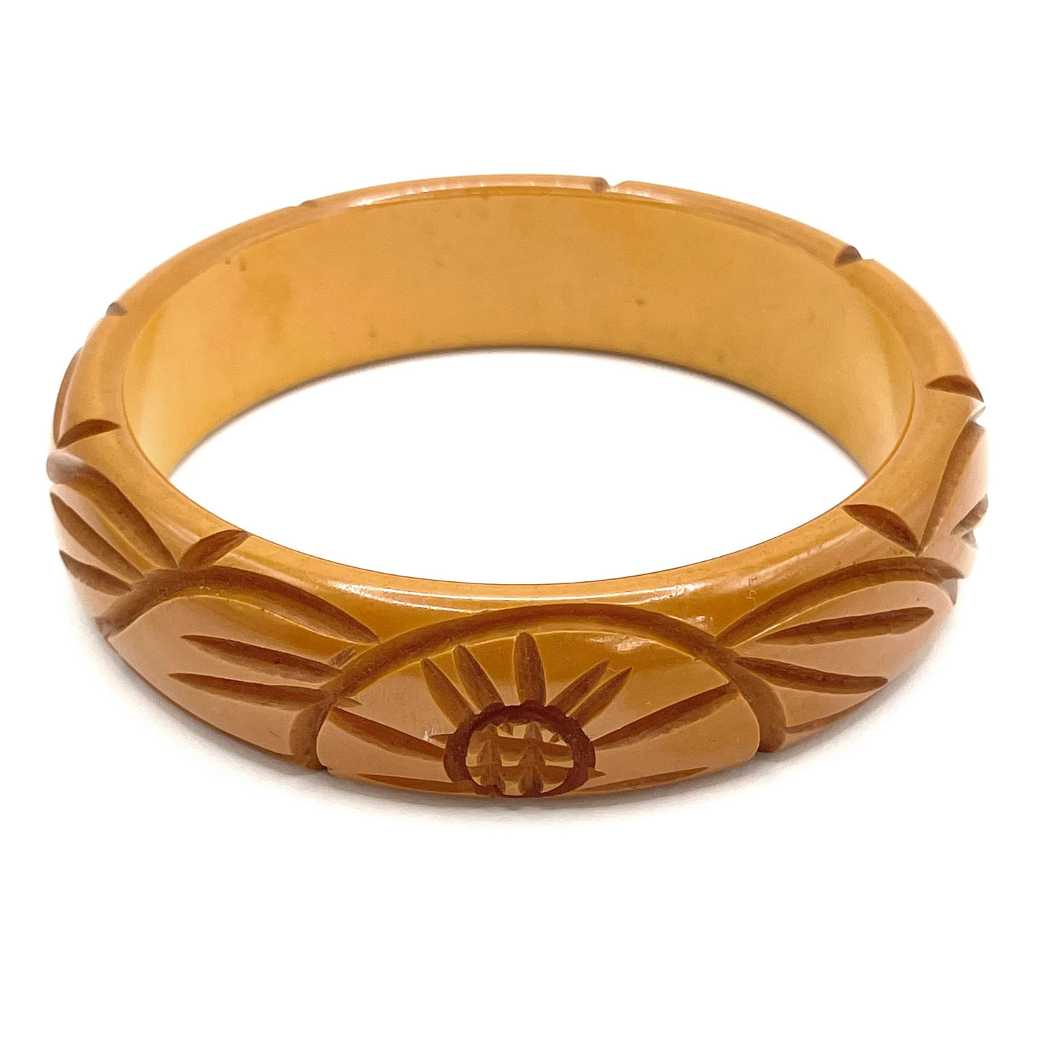 deeply carved bakelite bangle