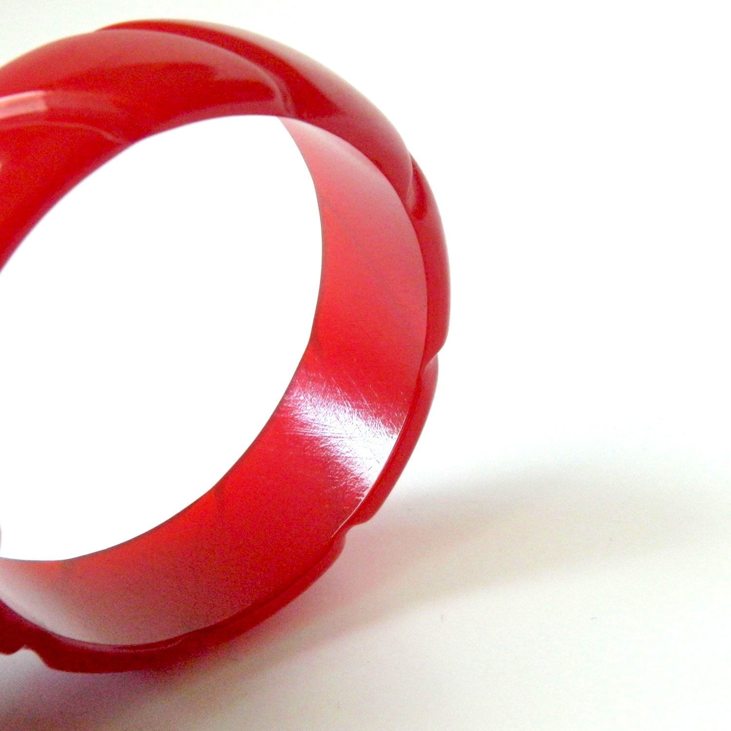 Carved red bakelite bangle