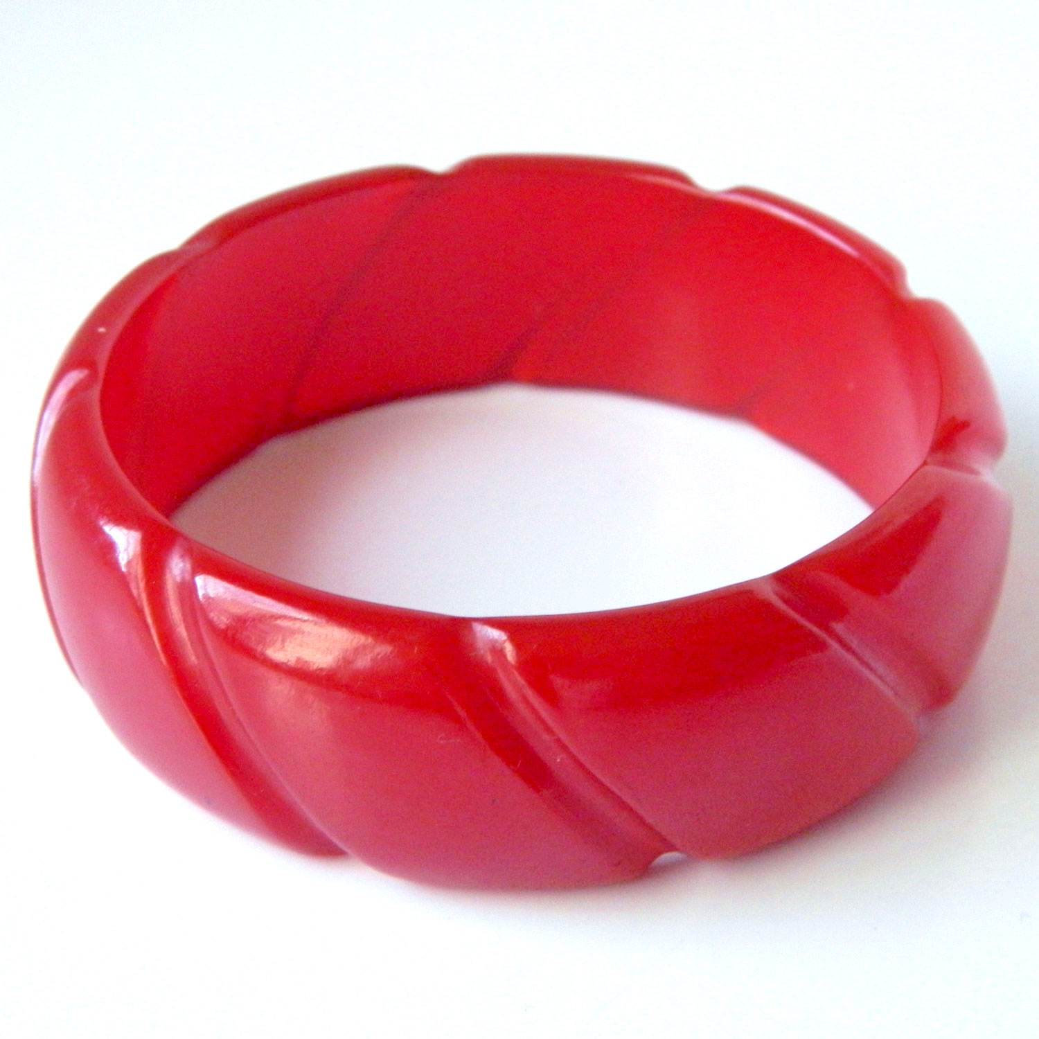 Carved red bakelite bangle