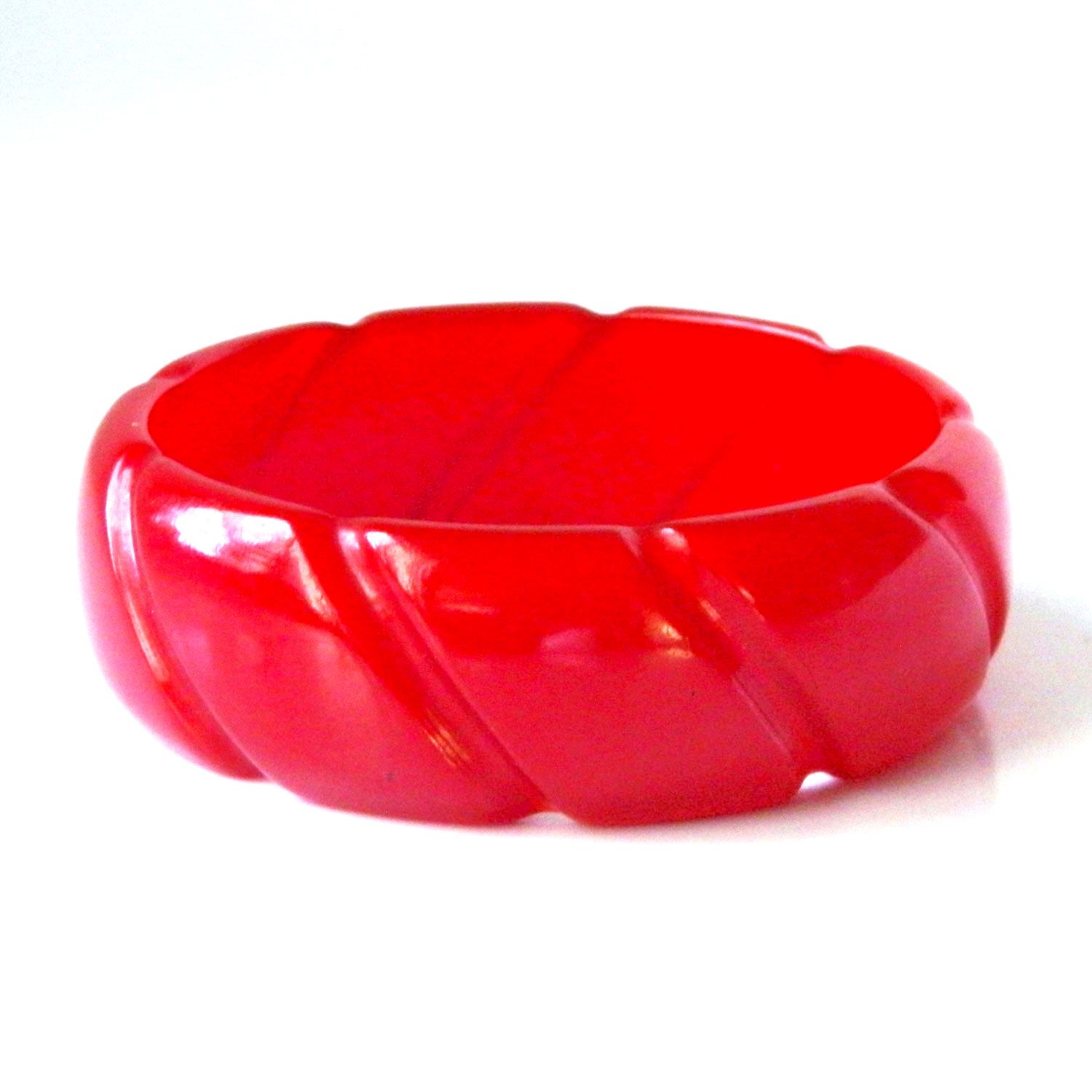 Carved red bakelite bangle