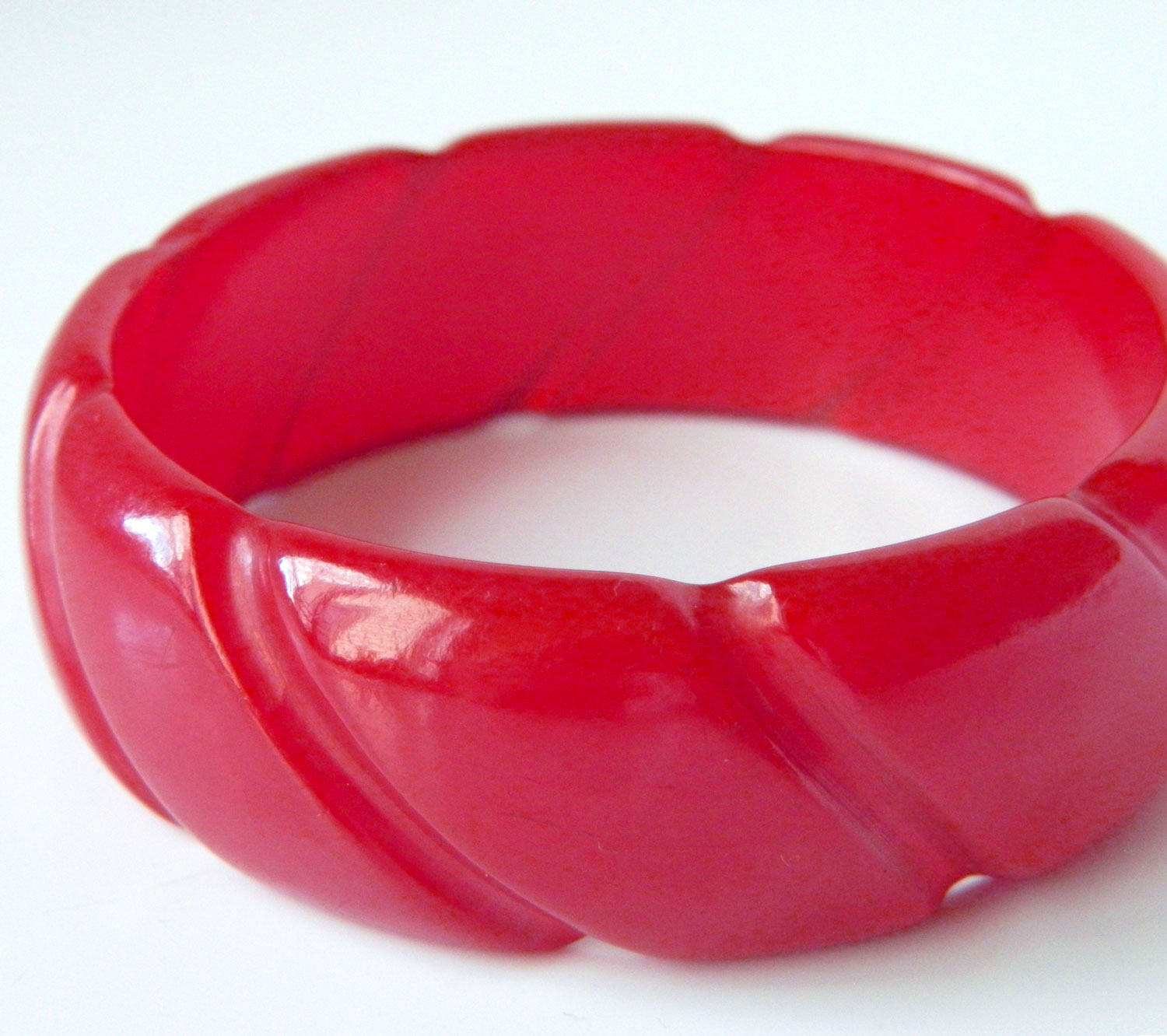 Carved red bakelite bangle