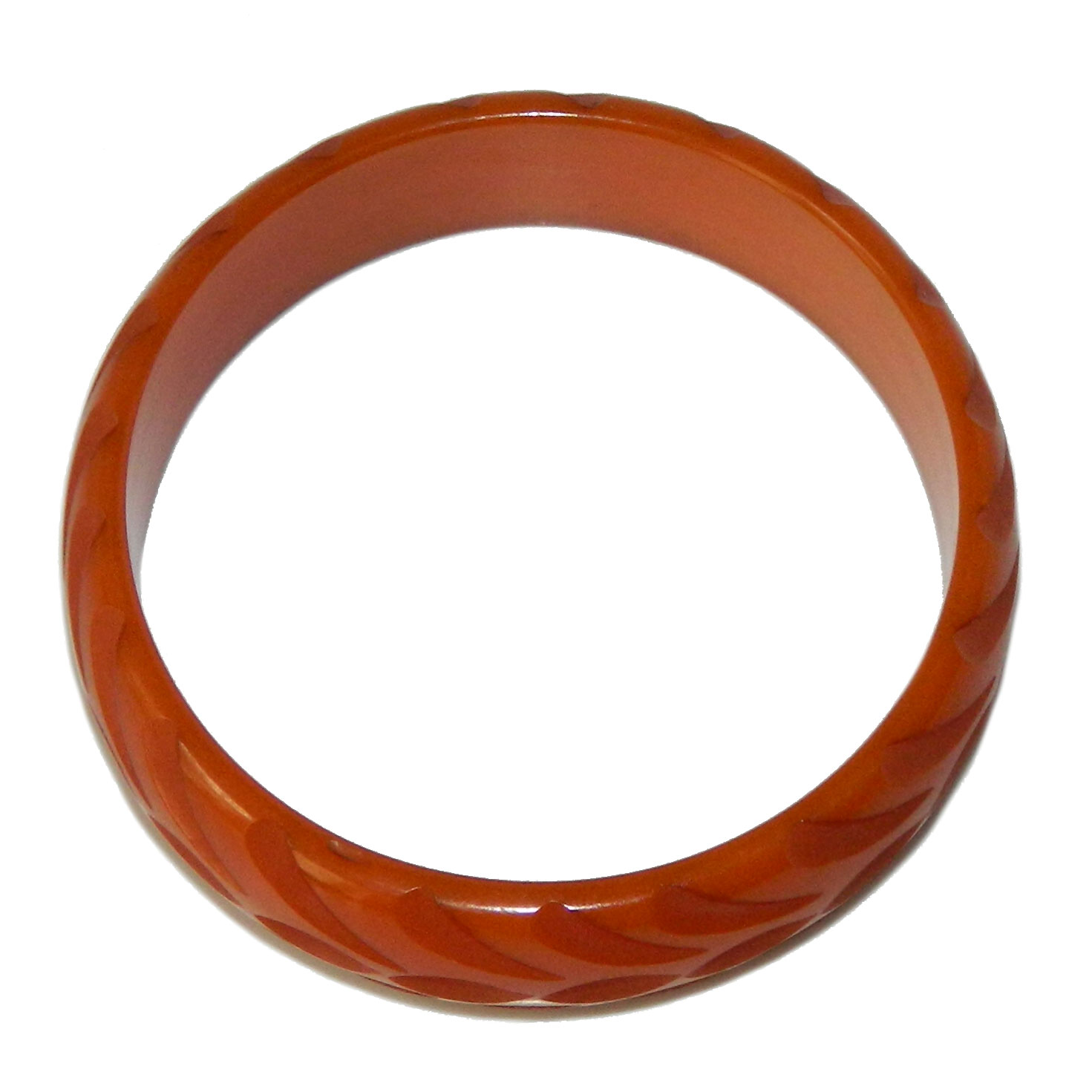 Carved orange bakelite bangle