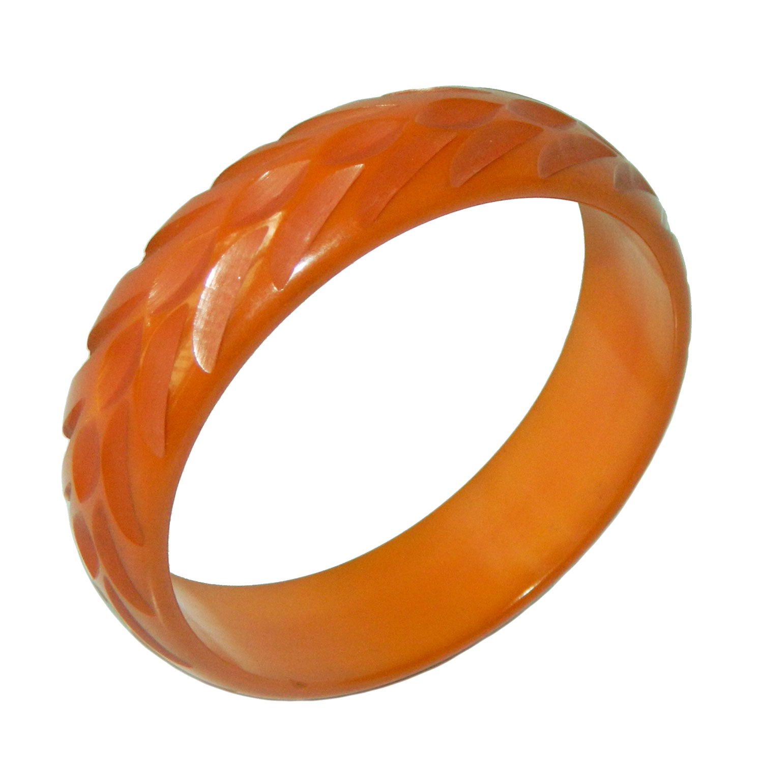 Carved orange bakelite bangle