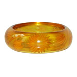 Reverse carved bakelite bangle bracelet