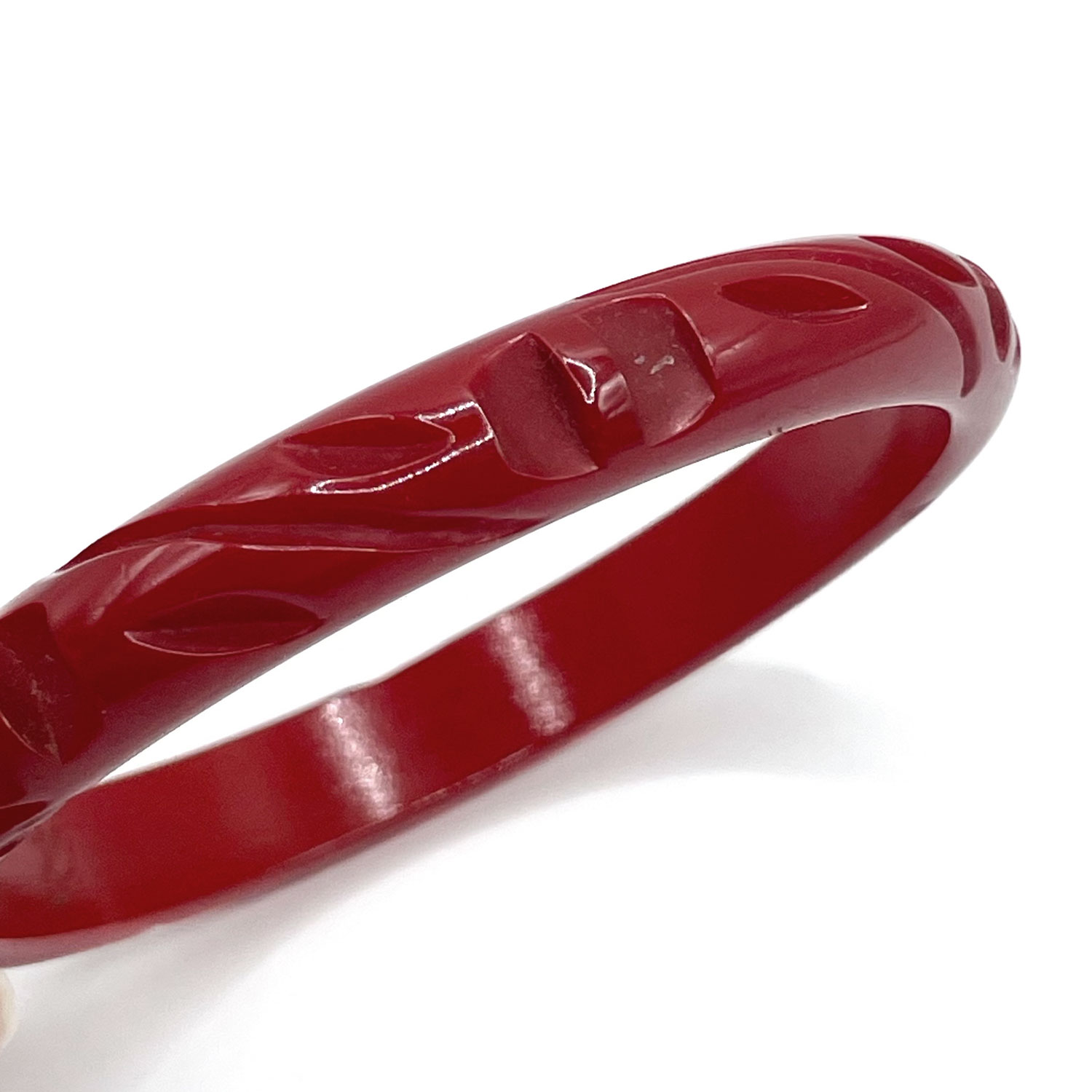Scarlet red carved bakelite bangle