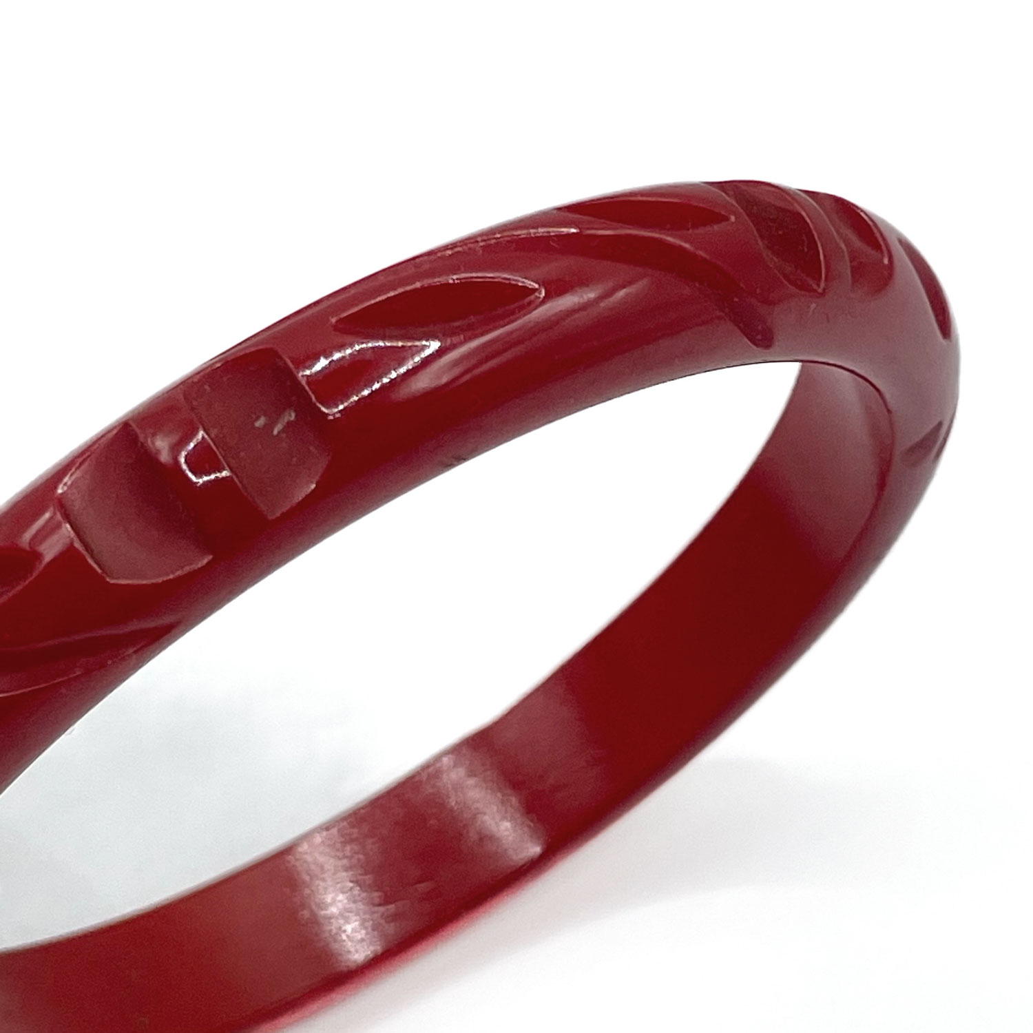 Scarlet red carved bakelite bangle