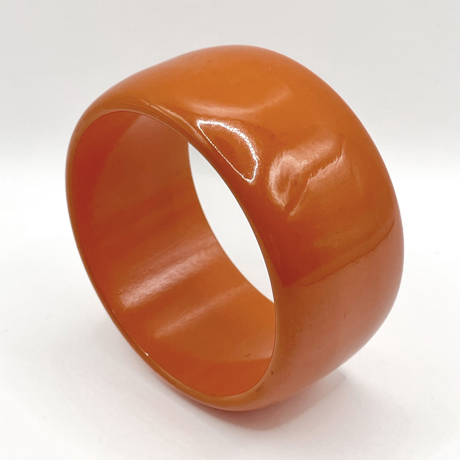 Orange bakelite bangle bracelet