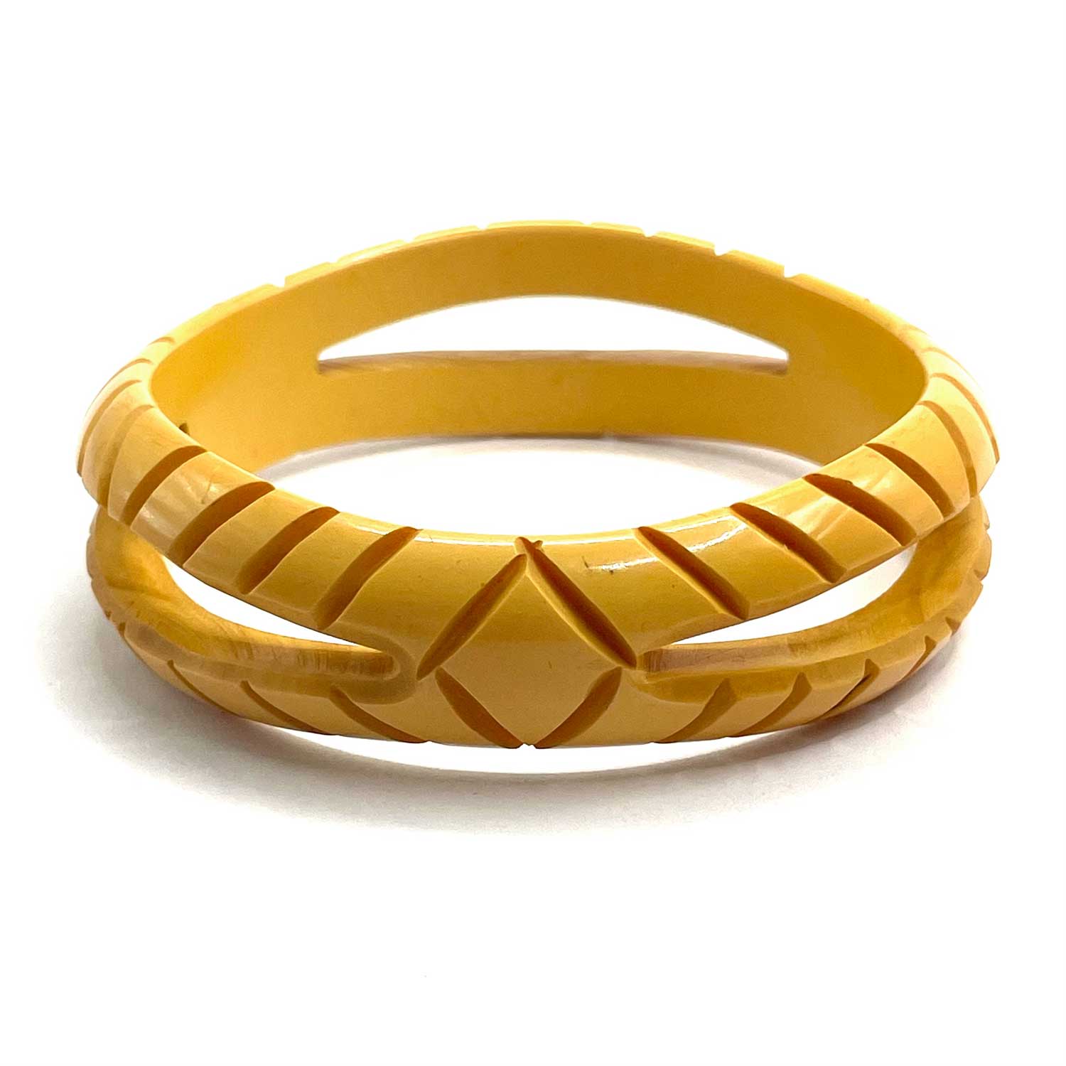 Carved pierced bakelite bangle