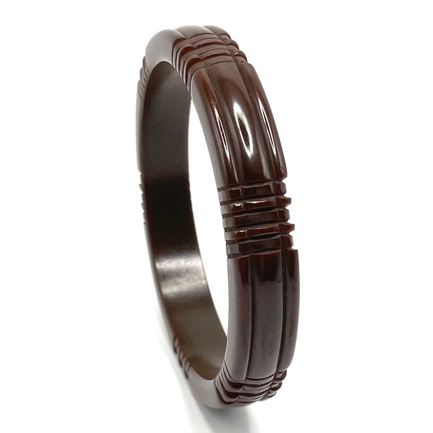 Carved brown bakelite bangle