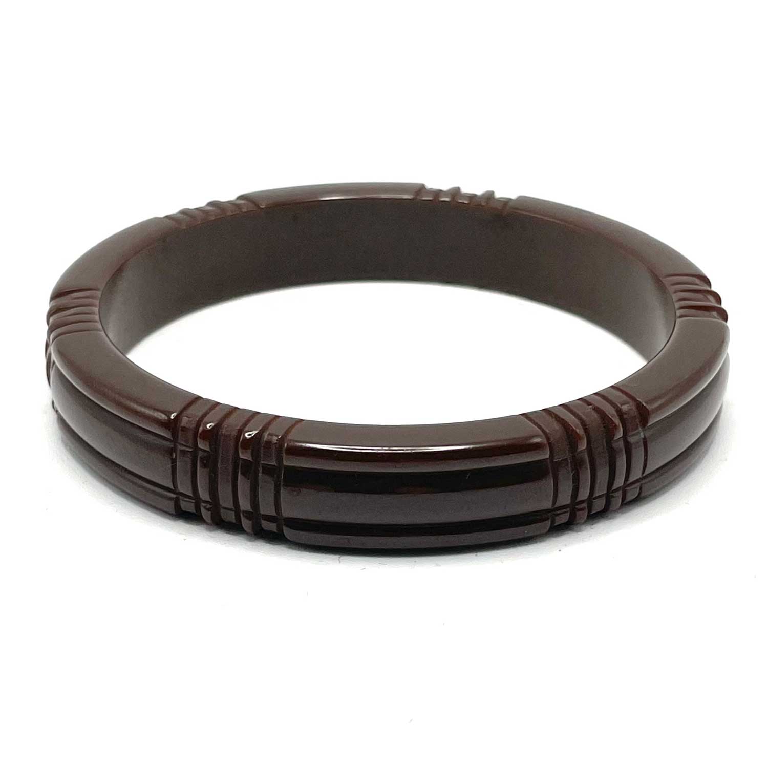 Carved brown bakelite bangle