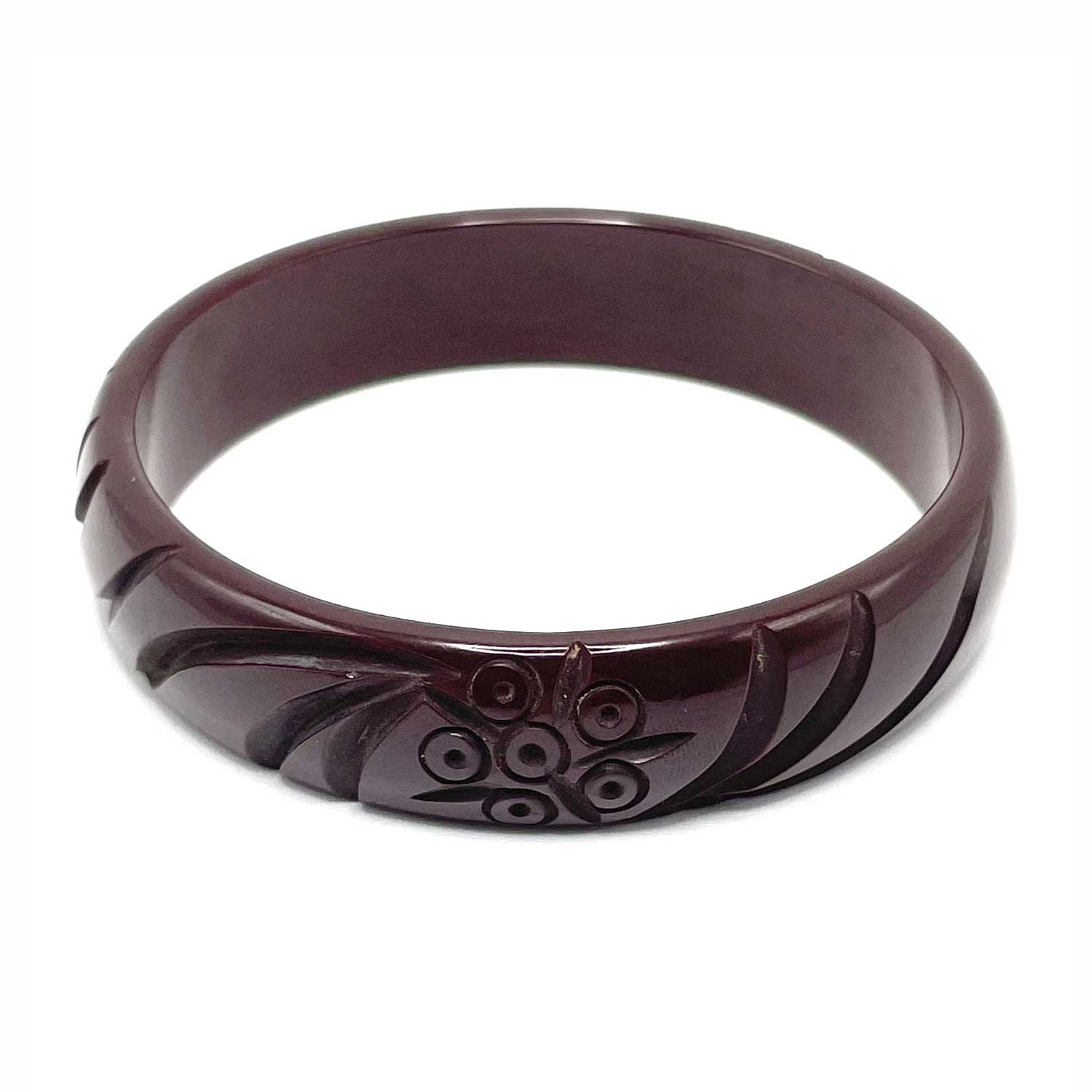 Carved brown bakelite bangle