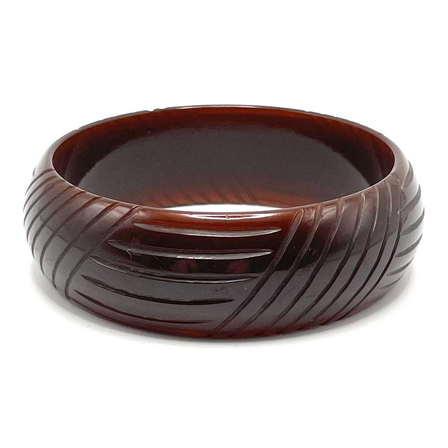 Carved brown bakelite bangle