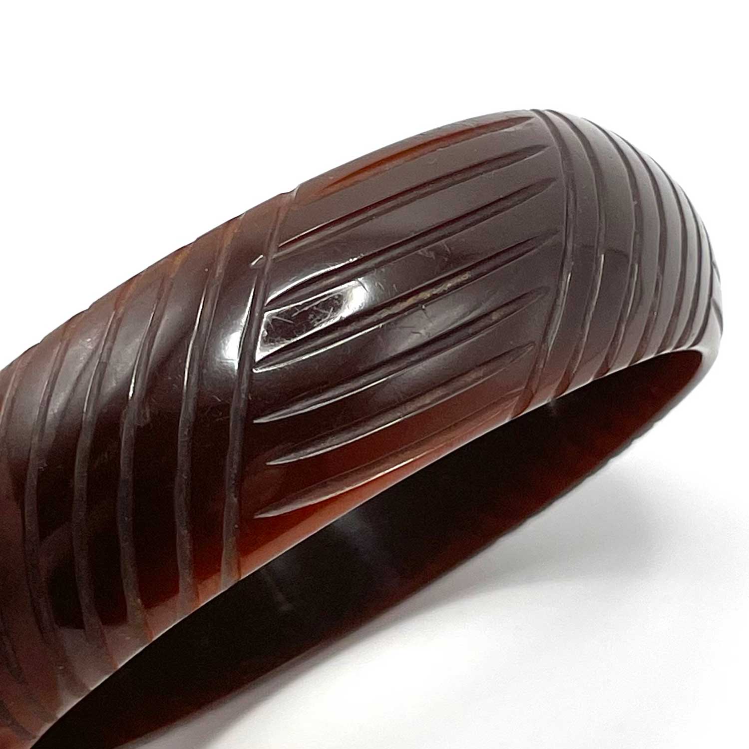Carved brown bakelite bangle