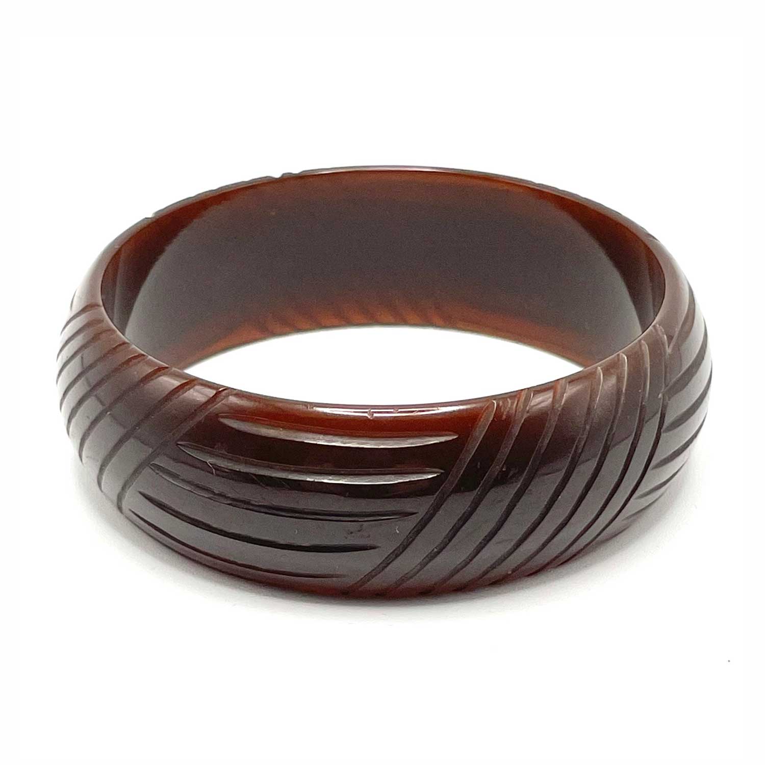 Carved brown bakelite bangle