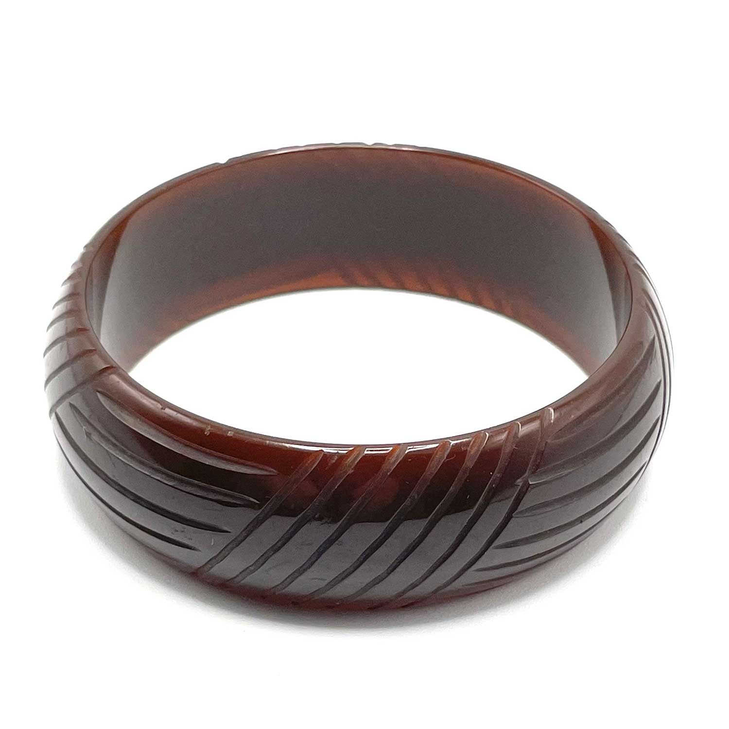 Carved brown bakelite bangle