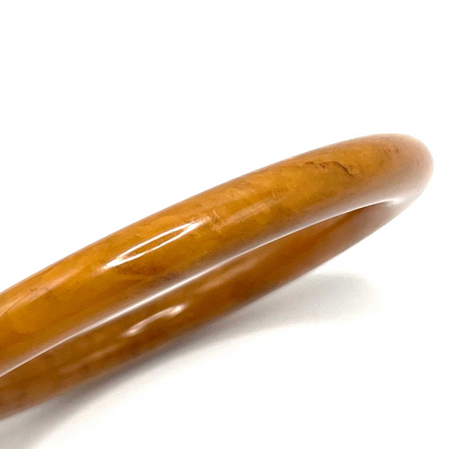Swirly caramel bakelite bangle