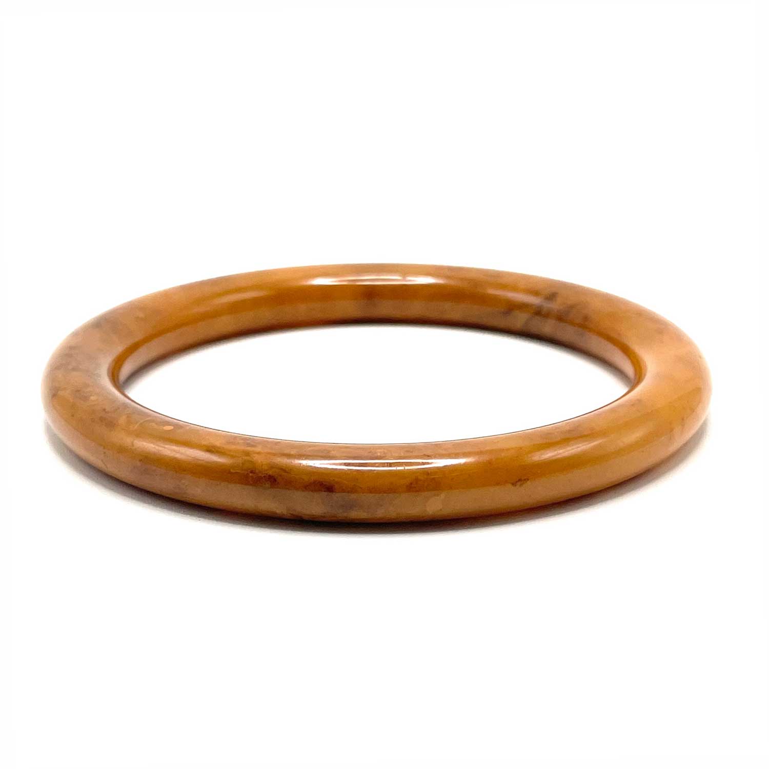 Swirly caramel bakelite bangle