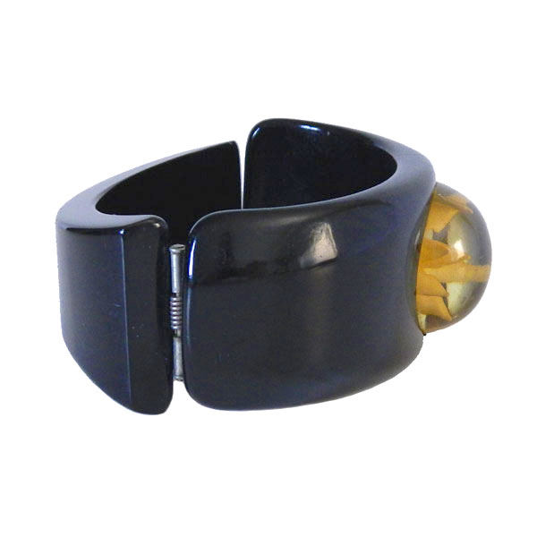 Bakelite bangle reverse carved