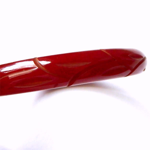 Carved cinnamon bakelite bangle