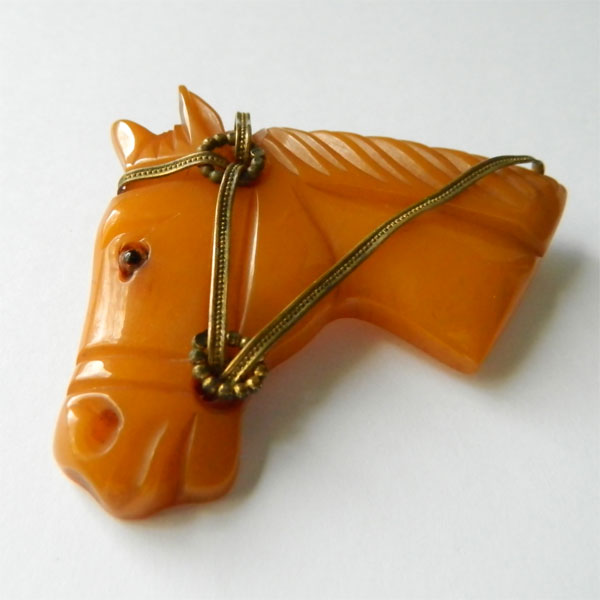 bakelite horse head brooch