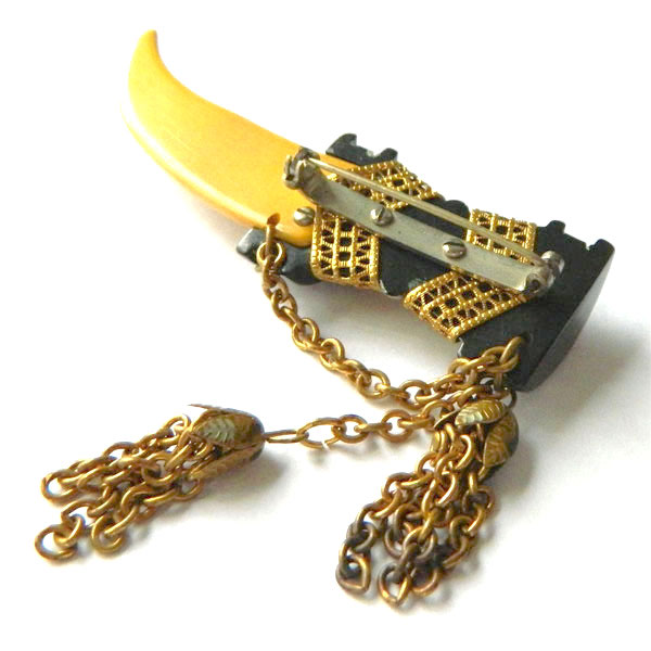 1930's bakelite dagger brooch