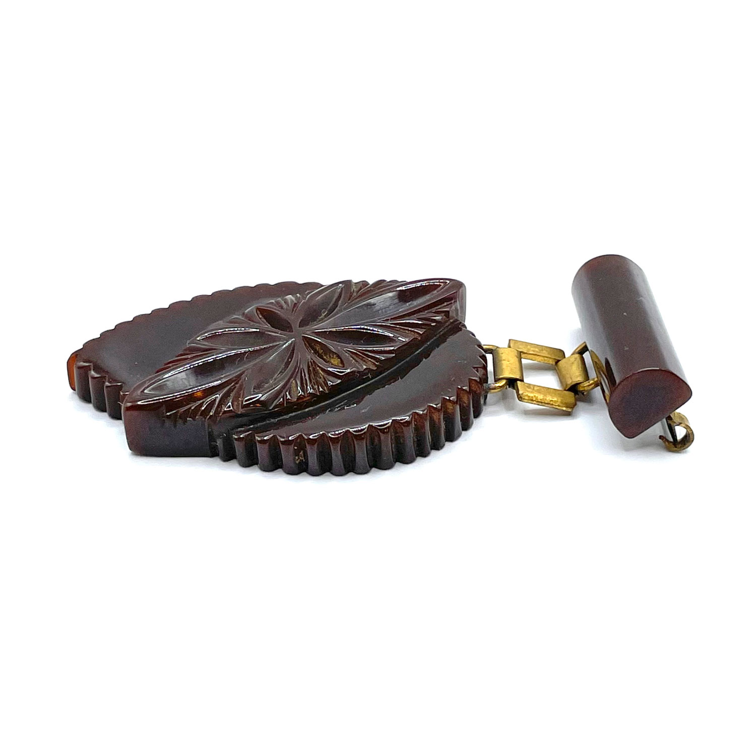 Hand carved bakelite brooch