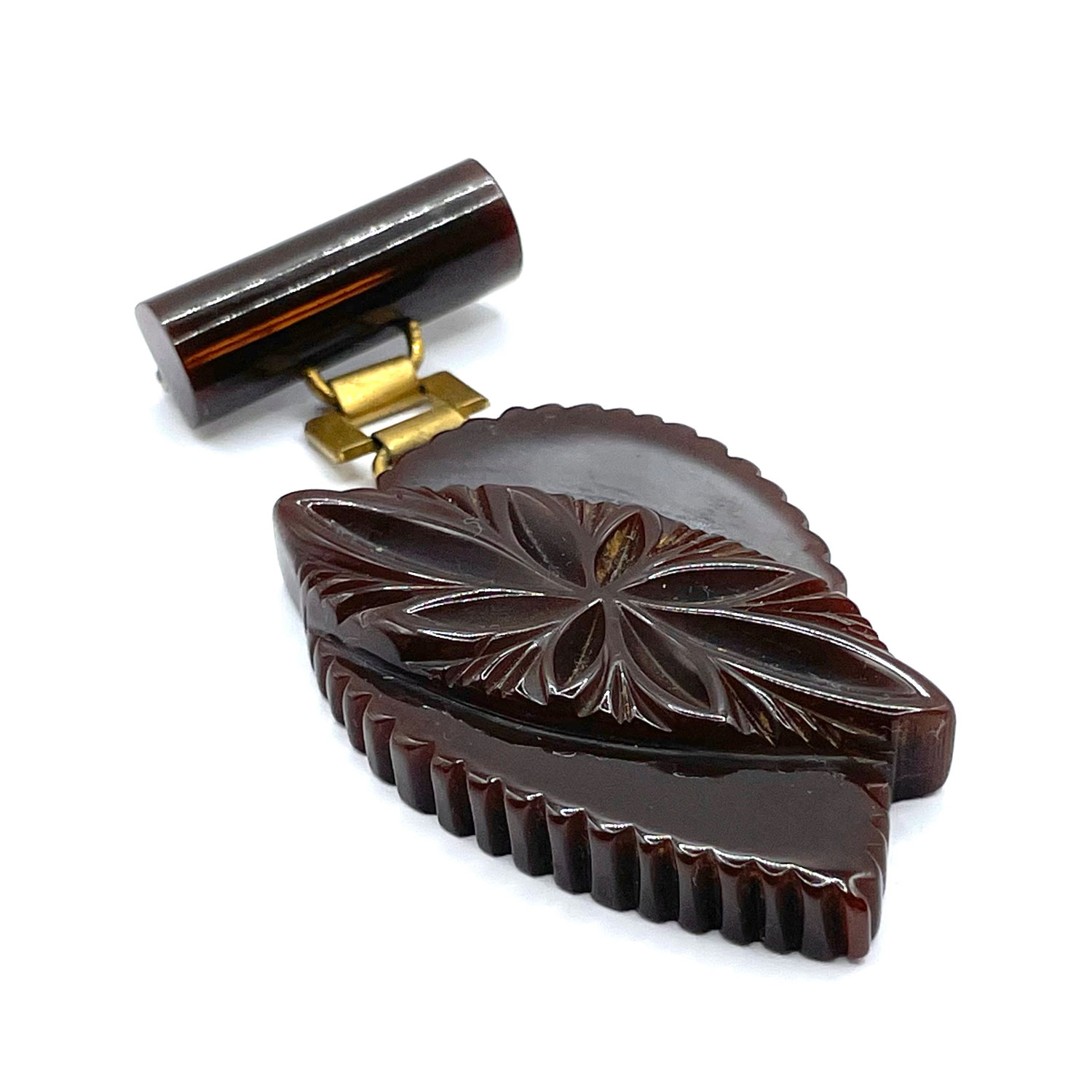 Hand carved bakelite brooch