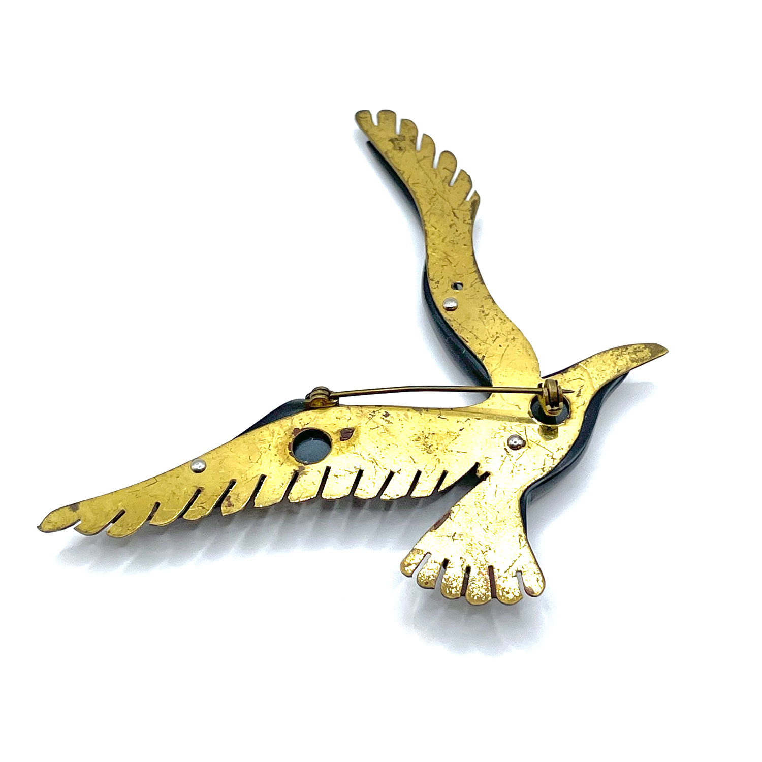Bakelite and brass bird brooch