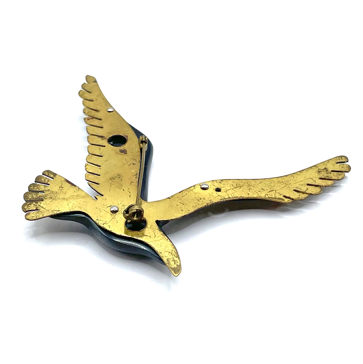 Bakelite and brass bird brooch