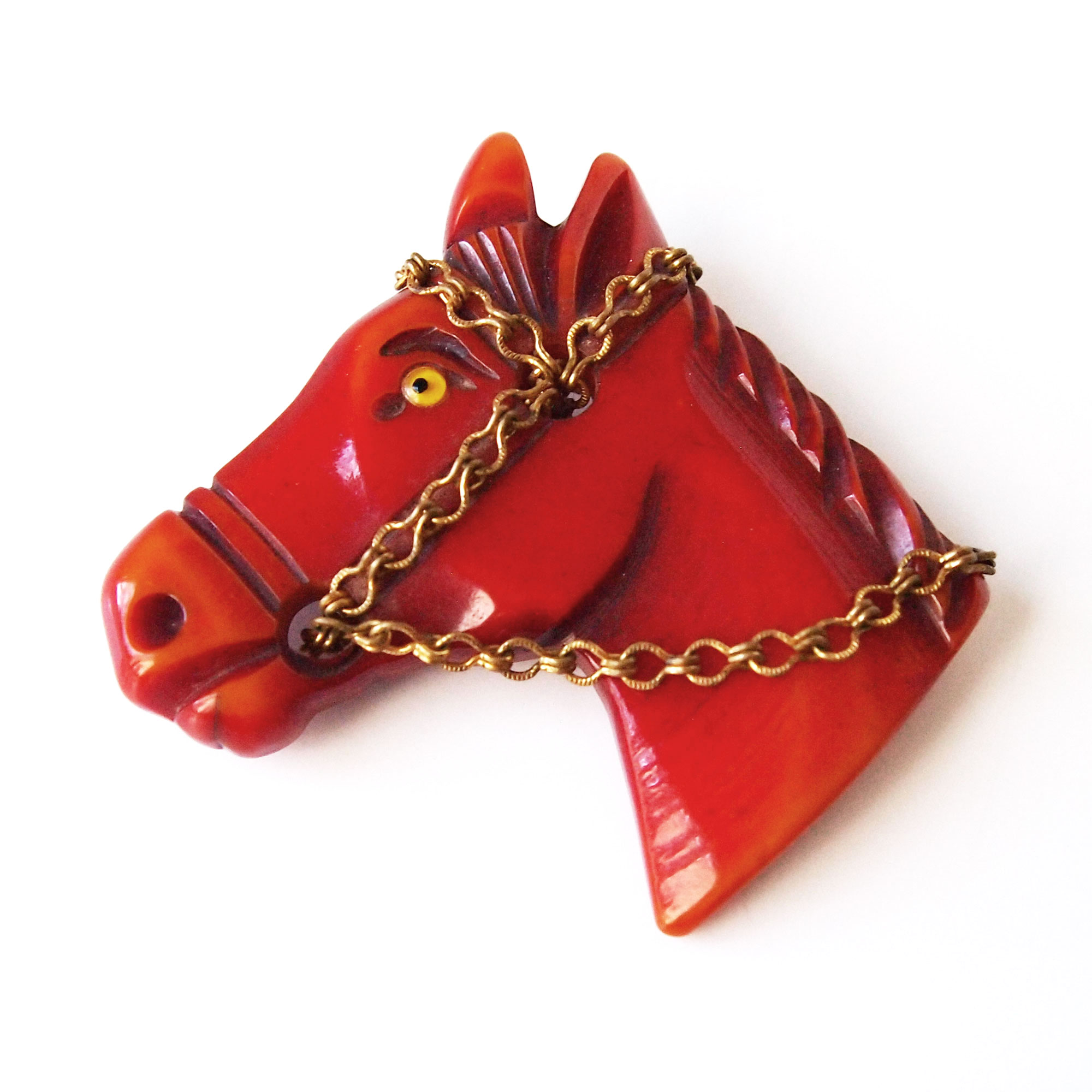 Hand carved bakelite brooch