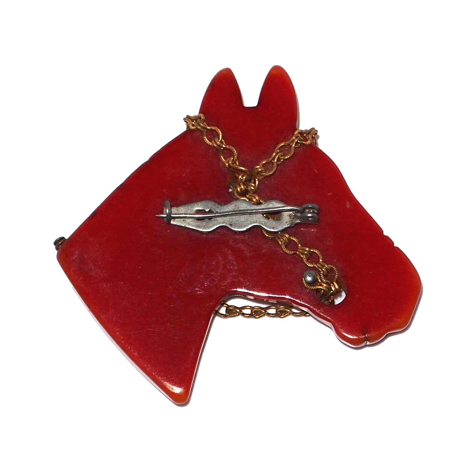 Hand carved bakelite brooch