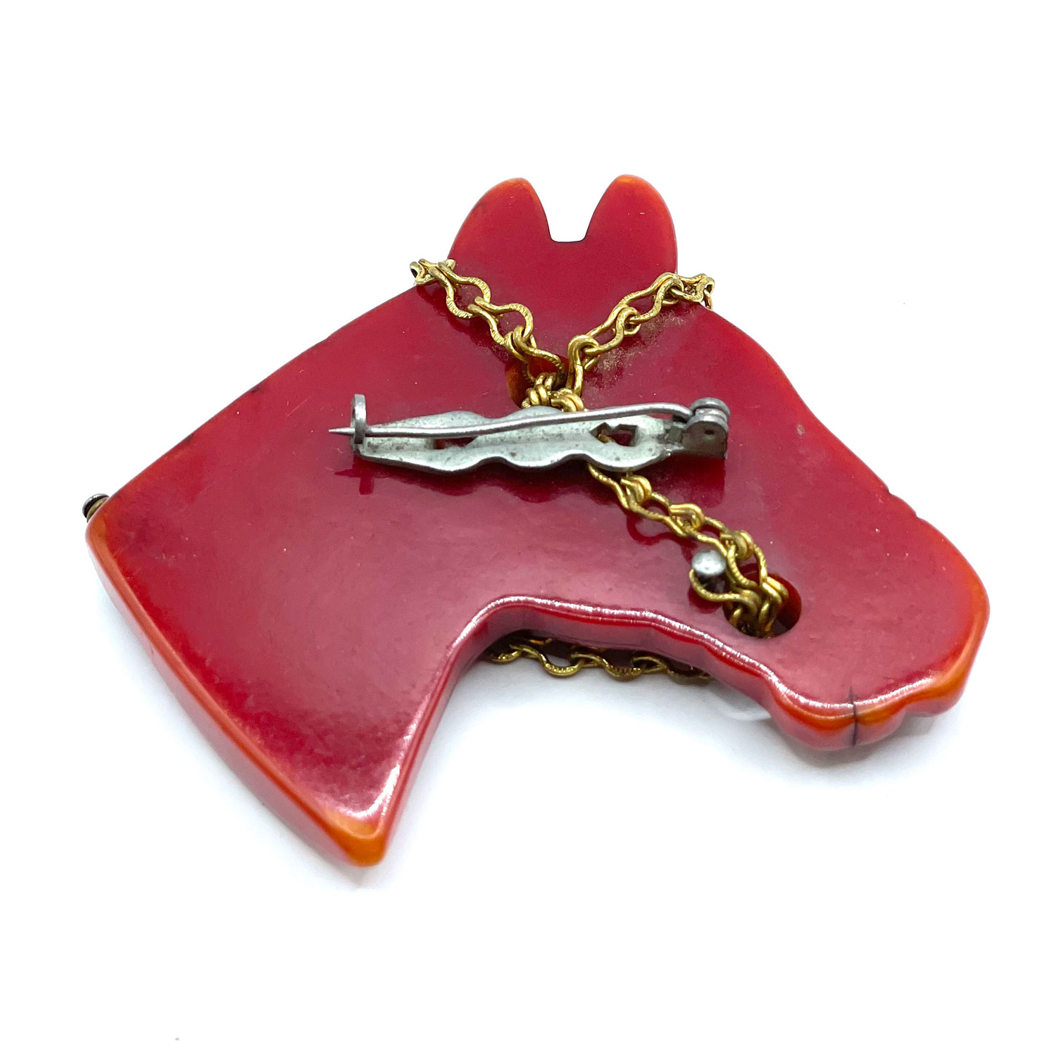 Hand carved bakelite brooch