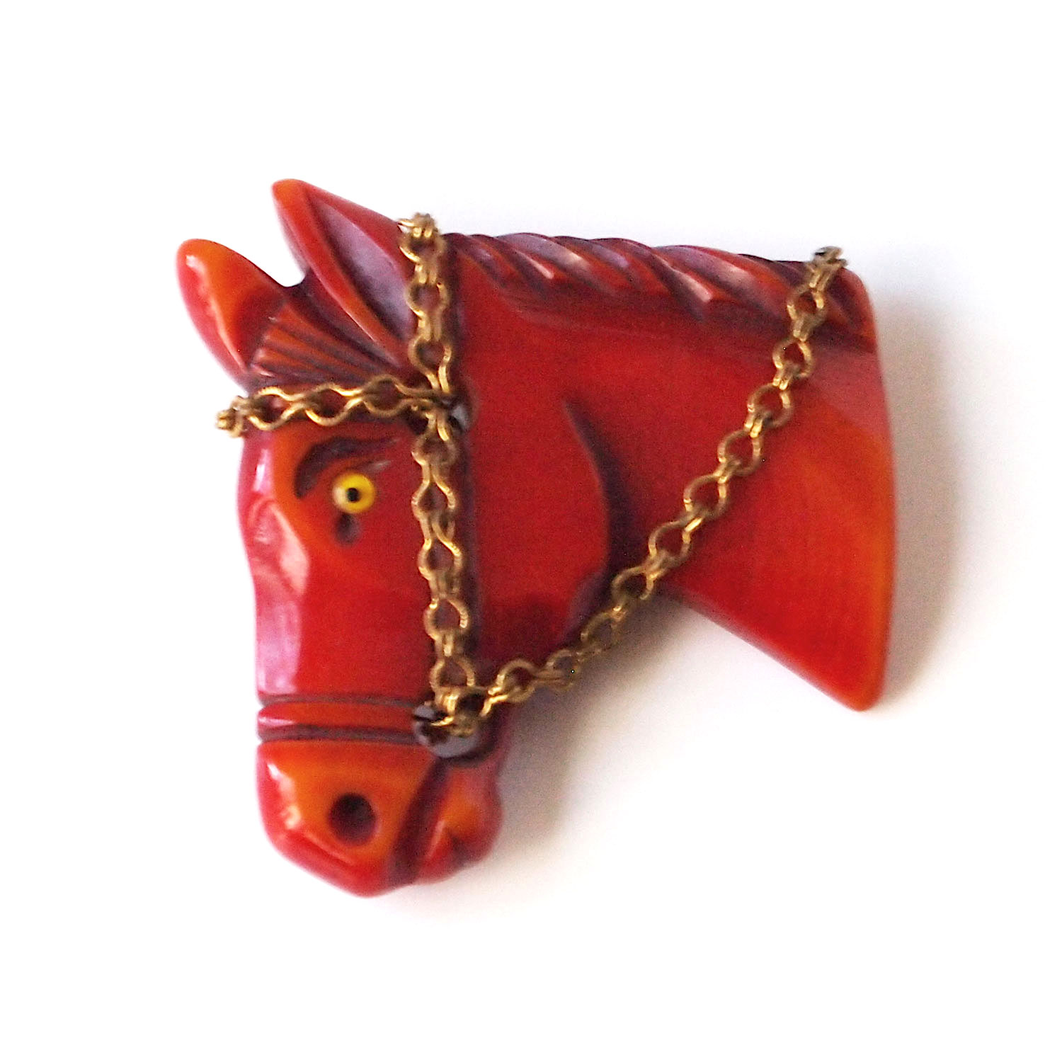 Hand carved bakelite brooch