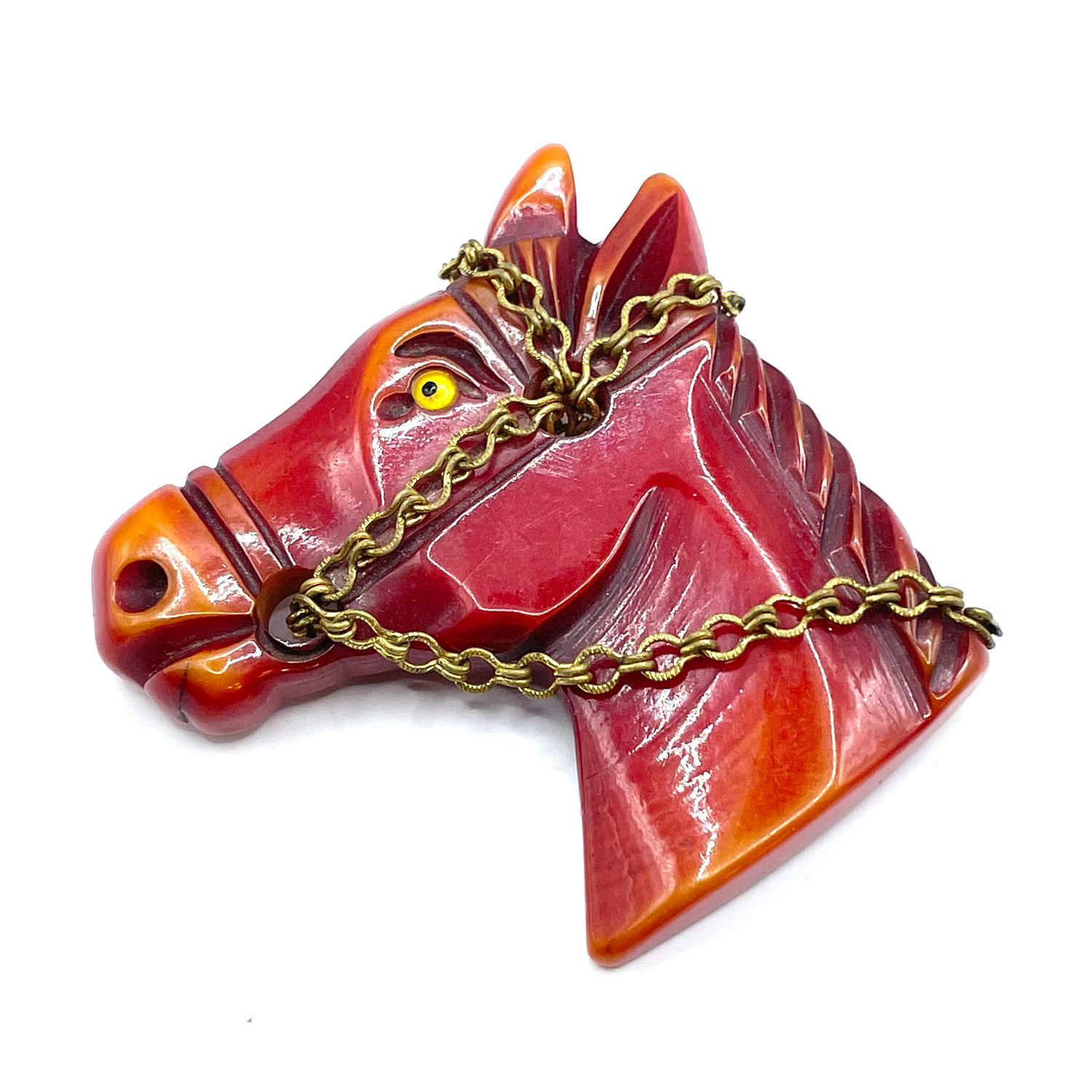 Hand carved bakelite brooch